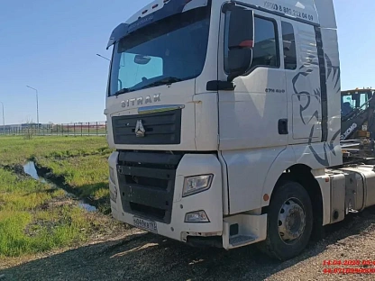 Тягач седельный Sitrak ZZ4186V391HE 000008281 - (АЛ)