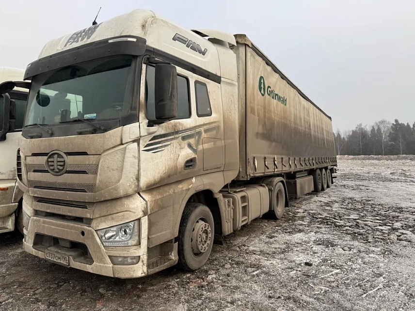 Тягач седельный FAW CA4180P66K24E4 000007903 - (АЛ)
