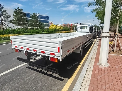 Бортовой грузовик ISUZU ELF 7т