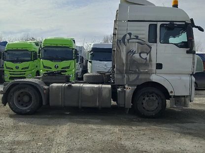 Тягач седельный Sitrak ZZ4186V391HE 000007491 - (АЛ)