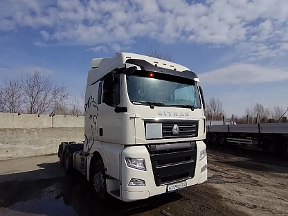 Тягач седельный Sitrak ZZ4256V363HE1B 000007772 - (АЛ)